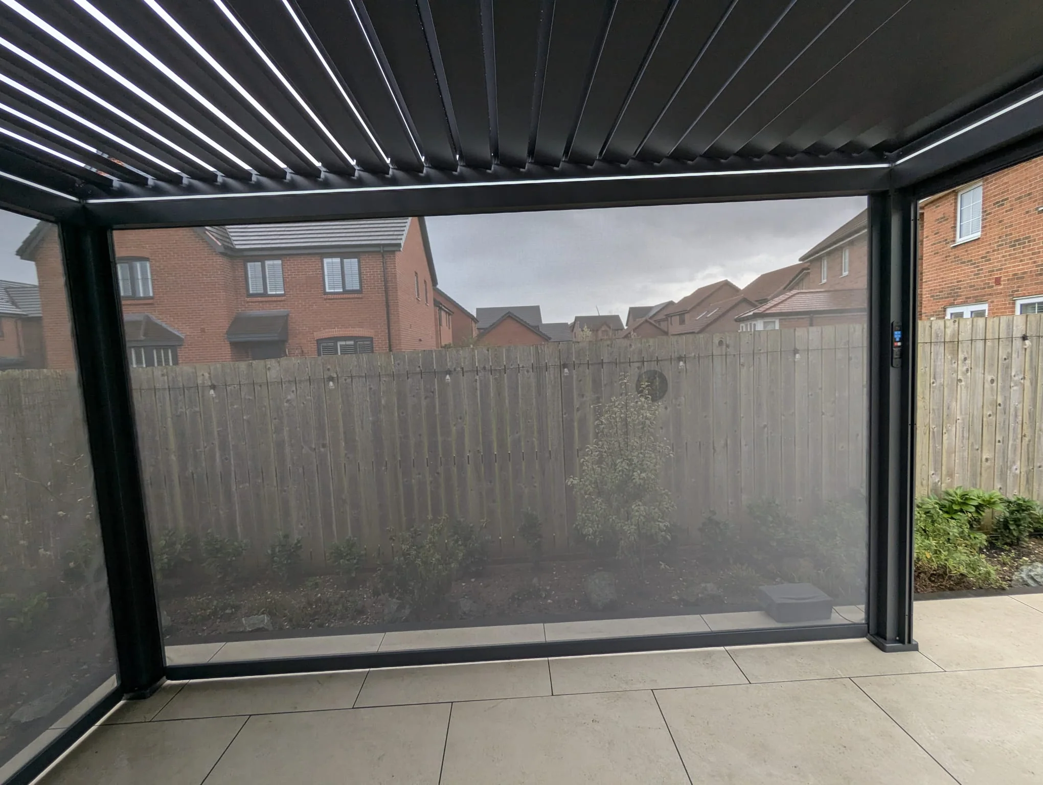 LuxShade™ 3×4m Aluminium Pergola with LEDs, Double-Layered Louvred Roof & 3 Blinds - Image 11
