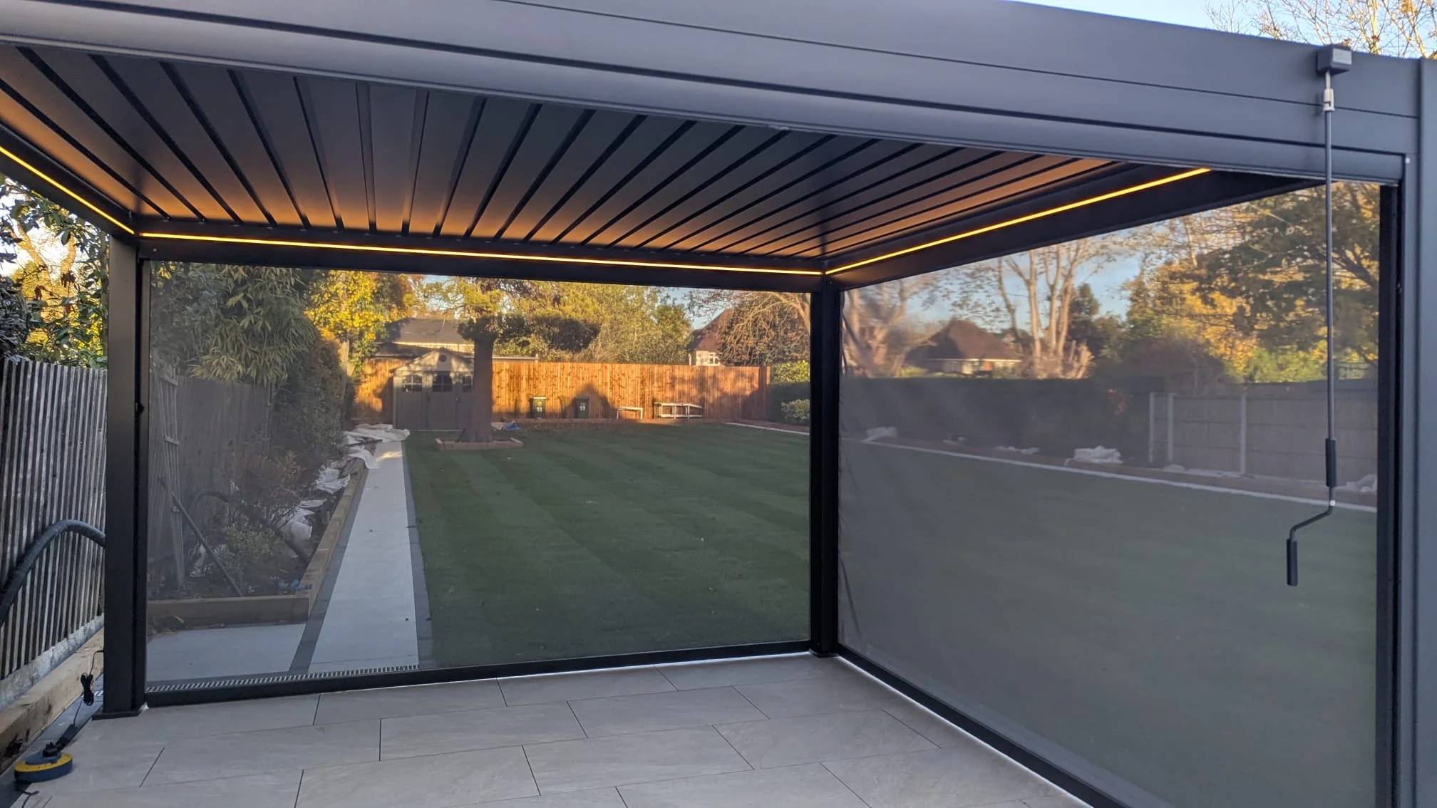 LuxShade™ 3×4m Aluminium Pergola with LEDs, Double-Layered Louvred Roof & 3 Blinds - Image 8
