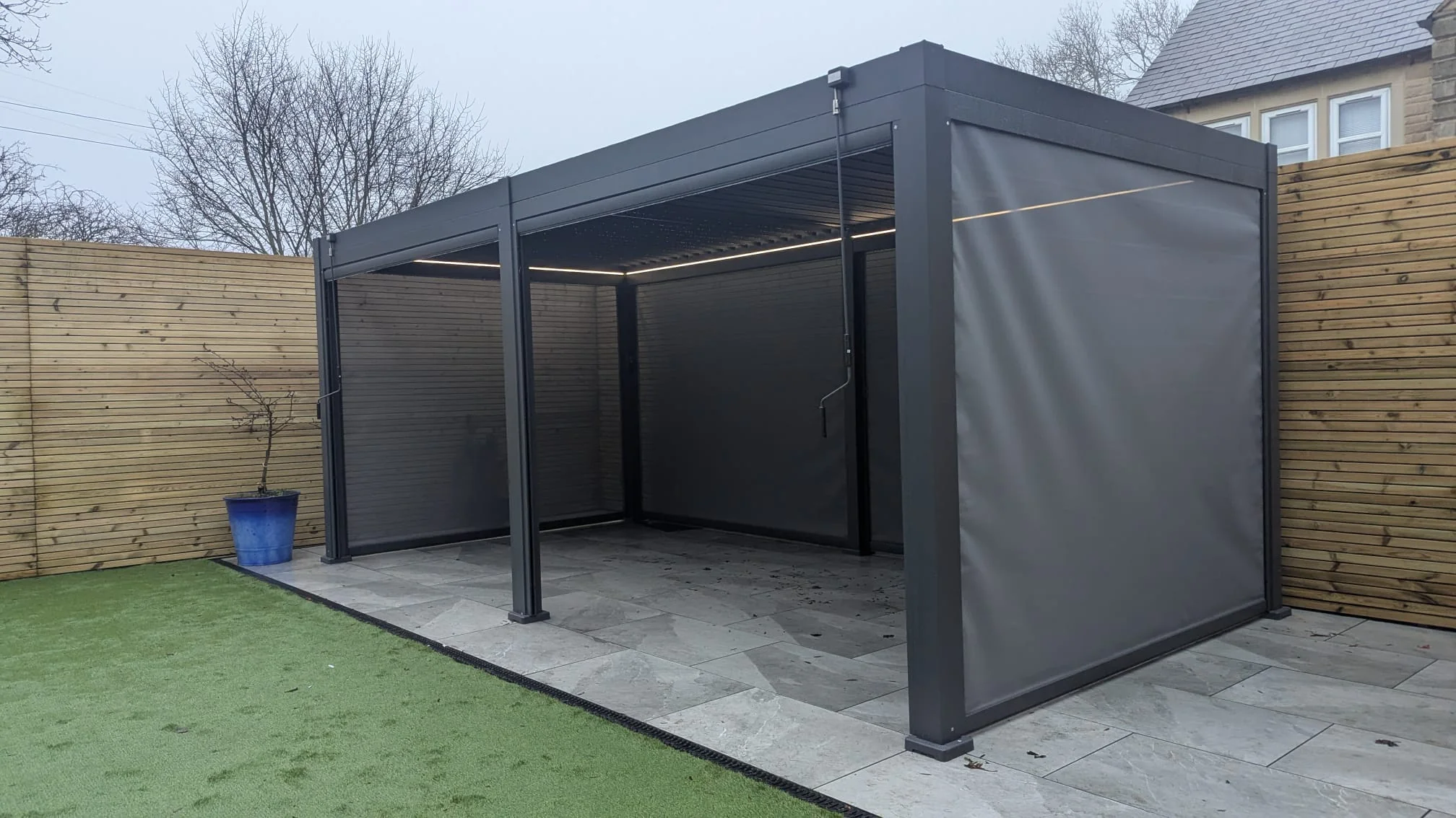 LuxShade™ 3×6m Aluminium Pergola with LEDs, Double-Layered Louvred Roof & Blinds - Image 3